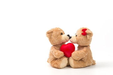 Valentines Day. Love heart. Couple Teddy Bears in embrace, hugging. Handmade red heart, ribbon, bow. Vintage retro romantic style.Unusual creative greeting card on wood. Family, wedding and friendship