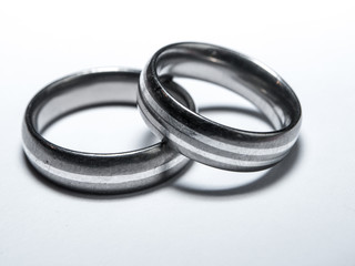 Two used wedding rings on white background - 132848961