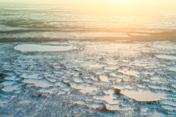 Fototapeta na wymiar Short winter day in tundra, top view