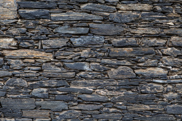 Stone wall. Outdoor background natural stone.