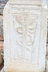 Close-Up of the Rod of Asclepius, an Ancient Greek Symbol Associated with Medicine, at Ephesus, Turkey