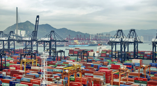 HONG KONG -MAY13: Containers at Hong Kong commercial port on May 03, 2013 in Hong Kong, China. Hong Kong is one of several hub ports serving more than 240 million tonnes of cargo during the year.