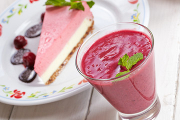 tasty cheesecake with smoothie