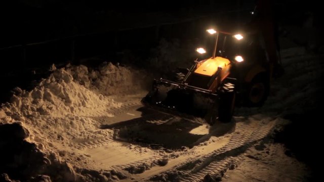 a tractor working at night