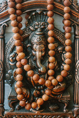 Hindu God - Ganesha with rudraksha rosary.