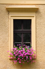 Fototapeta na wymiar Renaissance window with flowers