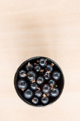 Black currants in a bowl.