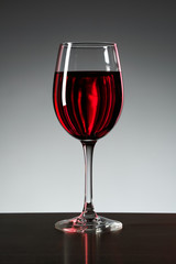 Wine glass on grey background