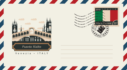 Naklejka premium an envelope with a postage stamp with Venice Puente Rialto, and the flag of Italy