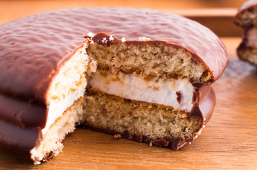 Biscuit with chocolate and a layer of milk souffle