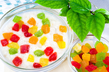Glass bowl with healthy oatmeal close-up