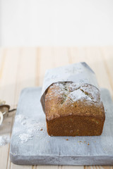 Japanese matcha green tea cake on a wooden board. 