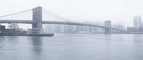 Brooklyn Bridge at fog.