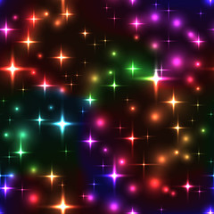 seamless background with rainbow stars and blurs
