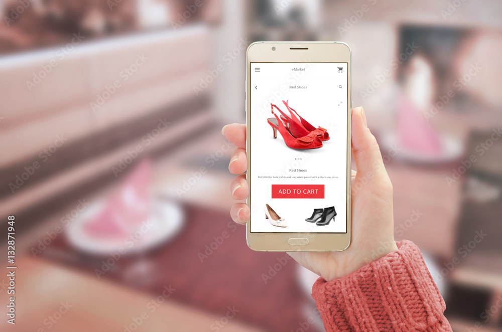 Aufkleber woman showing modern gold smart phone with online shopping app on device display. woman red shoes an