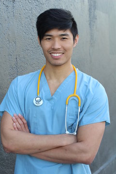 Male doctor with his arms crossed