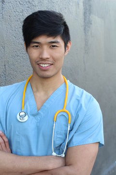 Doctor smiling with arms crossed