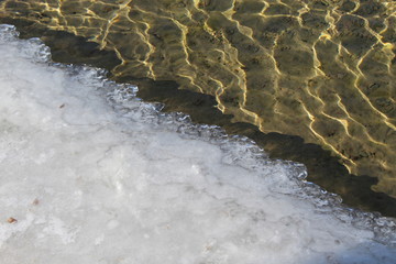 In lake, ice...
