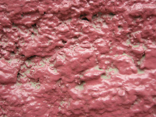 A background of old weathered chipped paint abstract texture  on wall and stucco