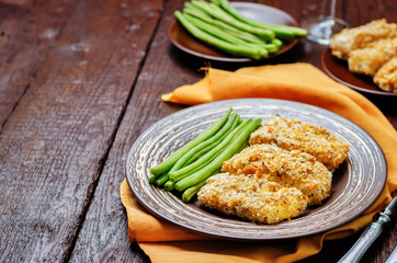 Bread crumbs cheese herbs baked cod with green beans