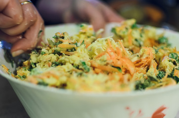 homemade cheese salad in a bowl, stir
