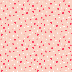 Vector retro cute seamless pattern with red and white hearts on the pink background for Valentine's day cards. Simple background for printing on fabric, paper for scrapbooking, gift wrap, wallpapers.