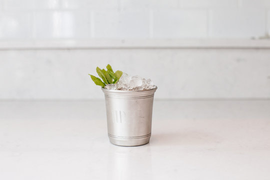 Mint julep cocktail in silver glass