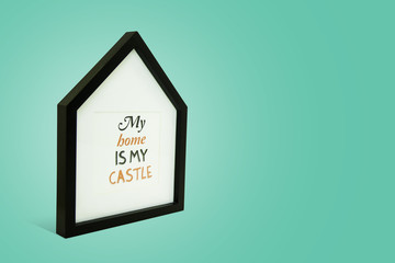 Photo frame in the form of the house with the inscription My hom