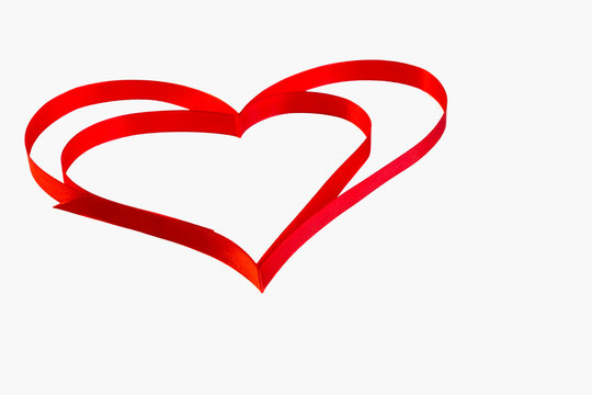 isolated heart of red ribbon on a white background for the  Vale