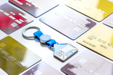 credit cards, key ring - concept mortgage on white background