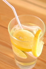 lemonade in a glass on wooden table