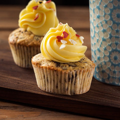St Valentine Love cupcakes with red hearts and butter cream. Instagram style square