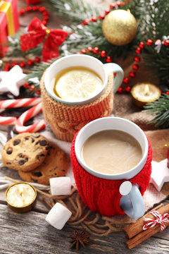 Cup of coffee and tea on a wooden table