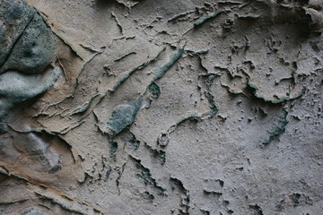 Sea cave wall covered in sand