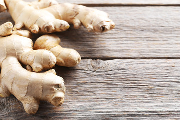 Ginger root on grey wooden table