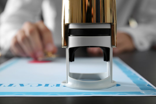 Self-ink stamp on notary public table