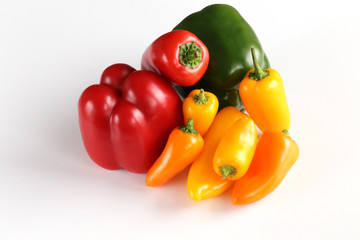 assorted bell peppers isolated on white background. 