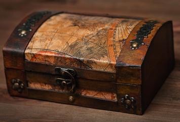 Vintage wooden casket in the form of an old chest