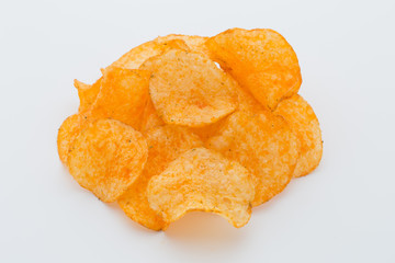 Crisps with paprica on a white background.