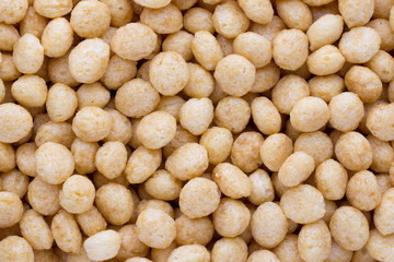 Corn flakes rings on the background.