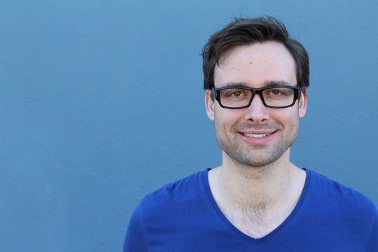 Handsome male with glasses portrait smiling with copy space 