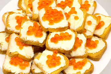 sandwiches with butter and red caviar