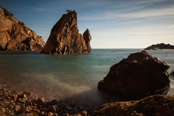 Fototapeta na wymiar Wild rocky beach in sintra cascais natural park in Portugal