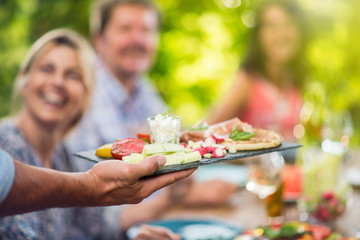 Aperitif tray served for friends on the terrace