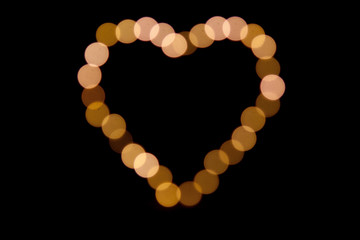 Bokeh warm lights. Beautiful St. Valentine's Day background.