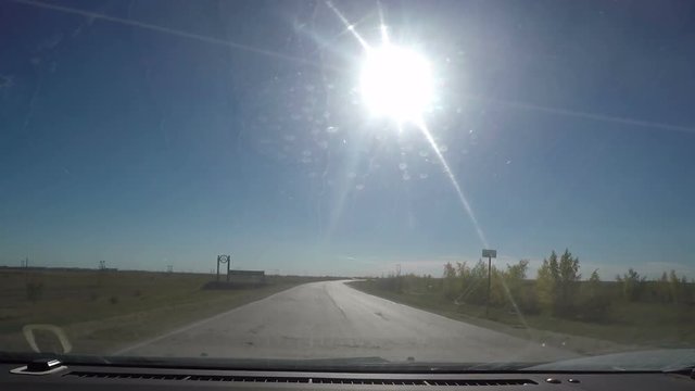 View from Car windshield. Road Trip on Suburban Road
