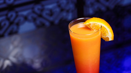 Campari orange cocktail. Colourful coctail on the black background