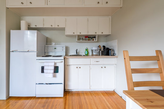 Modern cozy and bright white kitchen. Interior design.