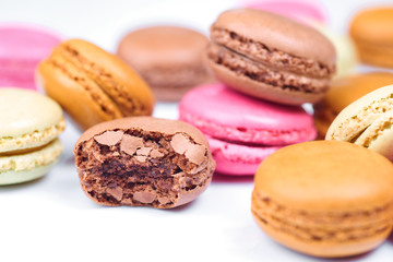 Colorful french macaroons on a white background
