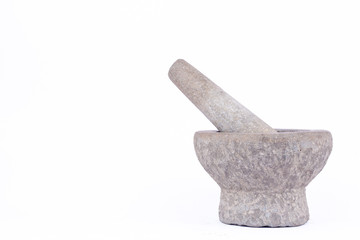 Old used granite stone mortar and pestle are Thai cooking tool on white background food isolated 
